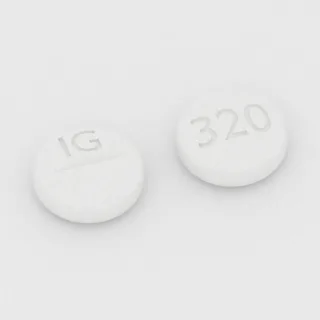 Benztropine 2 mg tablet: white, round, 6 mm, scored, imprinted IG on one side and 320 on the other.