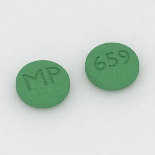 Clonidine 0.3 mg tablet: green, round, 7 mm, imprinted MP on one side and 659 on the other.