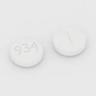 Béthanéchol 5 mg en comprimé : blanc, rond, 6 mm, sécable, inscription 934.