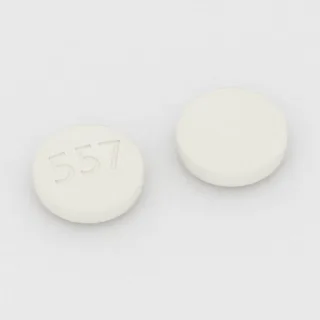 Carbamazepine 400 mg tablet: white, round, 12 mm, imprinted 557.
