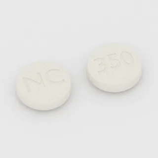 Karyzoprodol 350 mg, tabletka: biała, okrągła, 13 mm, z oznaczeniem NC po jednej stronie i 350 po drugiej.