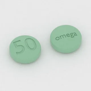 Chlorpromazine 50 mg tablet: green, round, 7 mm, imprinted 50 on one side and omega on the other.