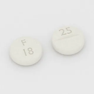 Klindamycyna 25 mg, tabletka: biała, okrągła, 5 mm, z linią podziału, z oznaczeniem F 18 25.