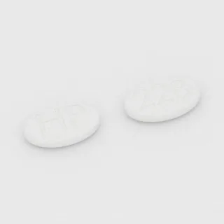 Asiklovir 800 mg tablet: beyaz, oval, 22 mm, bir yüzünde HP, diğer yüzünde 228 baskısı var.