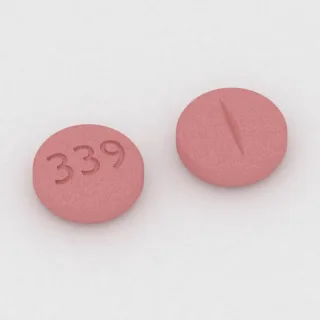 Benztropine 2 mg tablet: red, round, 6 mm, scored, imprinted 339.