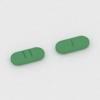 Chlortalidon 50 mg, tabletka: zielona, w kształcie kapsułki, 10 mm, z linią podziału, z oznaczeniem 11.