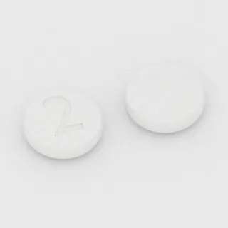 Buprenorfin 2 mg tablet: beyaz, yuvarlak, 7 mm, üzerinde 2 baskısı var.