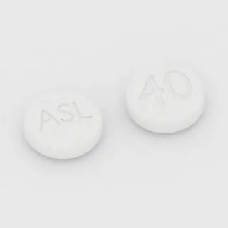 एज़िलसार्टन 40 mg टैबलेट: सफ़ेद, गोल, 8 mm, एक तरफ़ इम्प्रिंट ASL और दूसरी तरफ़ 40।