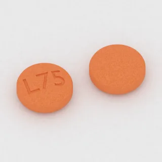 Amantadine 100 mg tablet: orange, round, 7 mm, imprinted L75.