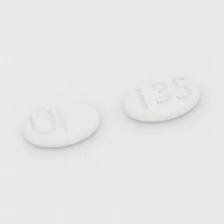 Clonidine 0.1 mg tablet: white, oval, 8 mm, scored, imprinted U on one side and 135 on the other.