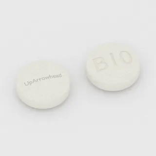 Buprenorphine 8 mg tablet: white, round, 10 mm, imprinted UpArrowhead on one side and B10 on the other.