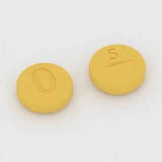 Clonazepam 0.5 mg Tablette: gelb, rund, 8 mm, mit Bruchkerbe, Prägung 0 auf der einen Seite und 5 auf der anderen.