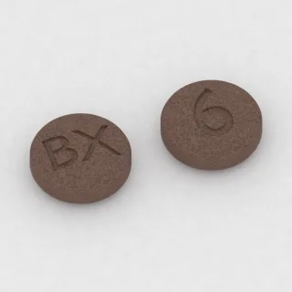 Brekspiprazol 0.25 mg, tabletka: brązowa, okrągła, 6 mm, z oznaczeniem BX po jednej stronie i 6 po drugiej.