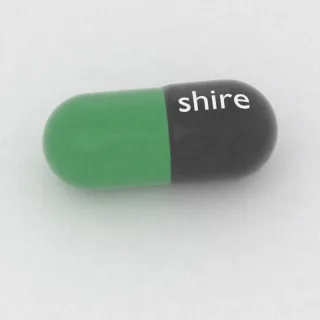 कार्बामाज़ेपिन 300 mg कैप्सूल: काला और हरा, 23 mm, इम्प्रिंट shire।