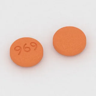 Buprenorfin ve nalokson 2 mg / 0.5 mg tablet: turuncu, yuvarlak, 6 mm, üzerinde 969 baskısı var.