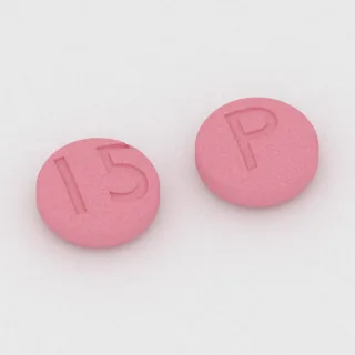 Aripiprazole 15 mg tablet: pink, round, 7 mm, imprinted 15 on one side and P on the other.