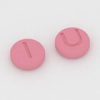 Amlodipine 2.5 mg tablet: pink, round, 5 mm, imprinted 1 on one side and U on the other.