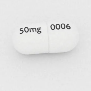 Celecoxib 50 mg capsule: white, 14 mm, imprinted 0006 on one side and 50mg on the other.
