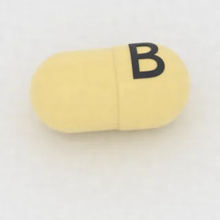 Benzonatat 200 mg Kapsel: gelb, 6 mm, Prägung B.