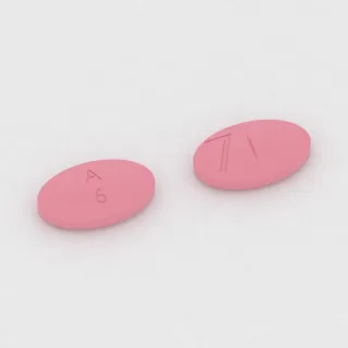 Tablet Amoksisilin 875 mg: merah muda, oval, 21 mm, bergaris bagi, dengan kode cetak A 6 7.