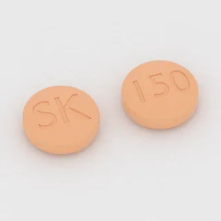 Tablet Senobamat 150 mg: oranye, bulat, 12 mm, dengan kode cetak SK di satu sisi dan 150 di sisi lainnya.