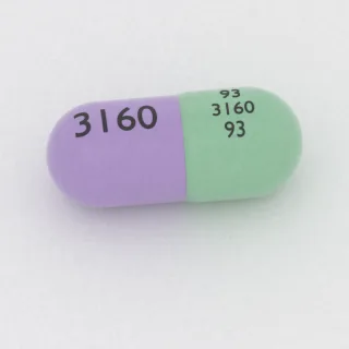 Cefdinir, cápsula de 300 mg: verde y morada, 23 mm, con la inscripción 93 3160 93 3160.