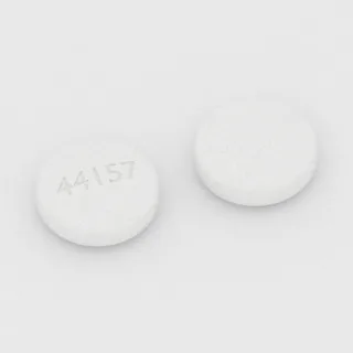 Aspirin 325 mg tablet: white, round, 10 mm, imprinted 44157.