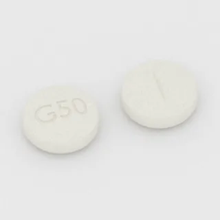 क्लोमीफीन 50 mg टैबलेट: सफ़ेद, गोल, 9 mm, विभाजन रेखा सहित, इम्प्रिंट G50।