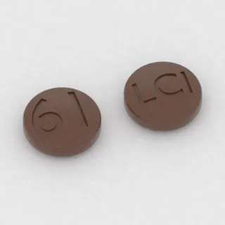 Chlorpromazine 10 mg tablet: brown, round, 7 mm, imprinted 61 on one side and LCI on the other.